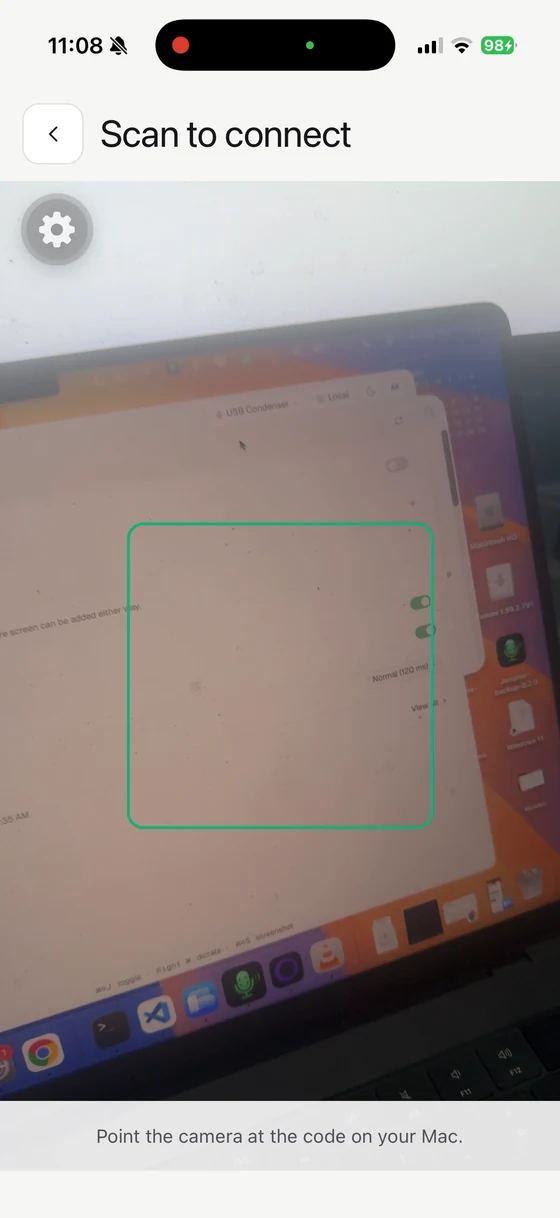 The Jompter Remote QR scanner pointed at a Mac showing the pairing code